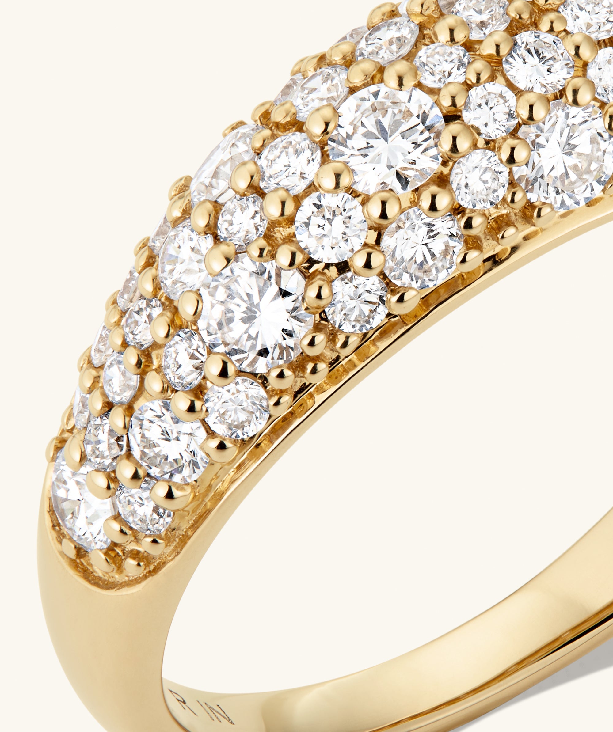 DÃ´me PavÃ© Lab Grown Diamond Ring with a cobblestone setting, showcasing densely packed diamonds for a smooth, unbroken shine.