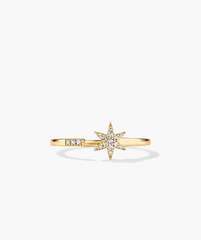 PavÃ© Diamond Star Open Ring: A 14k gold ring featuring a star design with pavÃ© diamonds, handcrafted for stacking elegance.