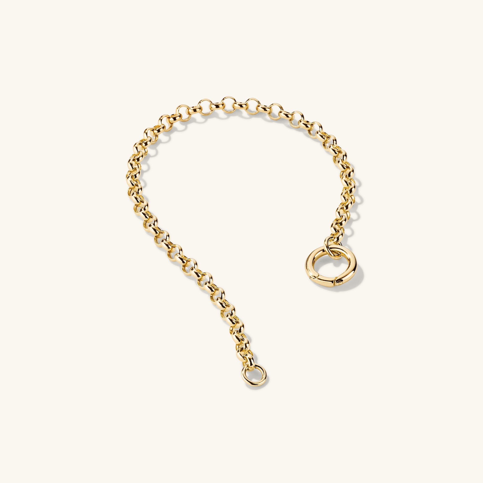 Rolo Chain Charm Bracelet in 14k solid gold, featuring a handcrafted design with a Stacker Clasp for layering multiple charms.