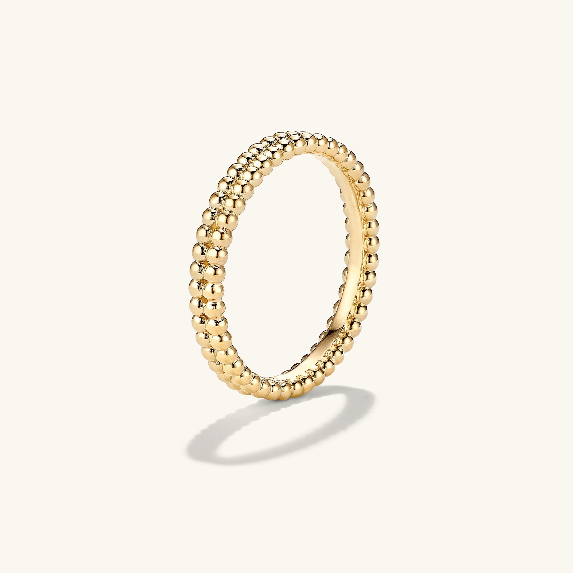 Duo Beaded Stacker Ring: An 18k gold vermeil ring featuring a double row of beads, perfect for stacking and adding texture to any jewelry collection.