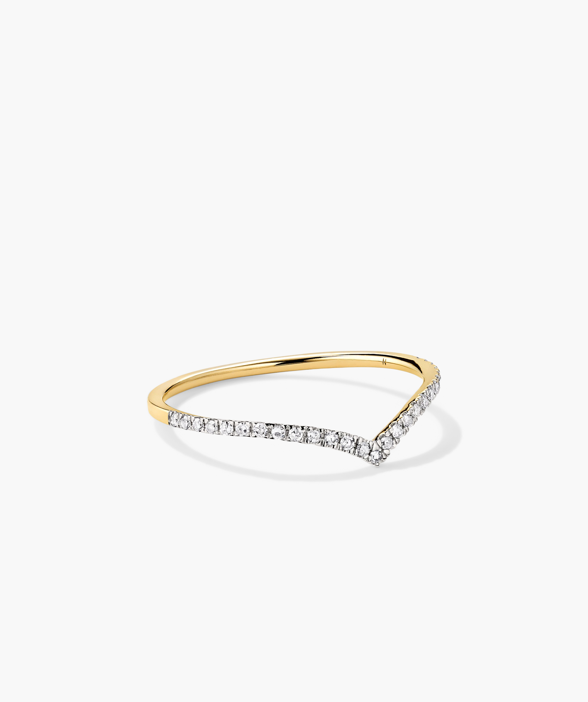 Wishbone Stacker Set featuring a gold and diamond ring alongside a gold and silver bracelet with diamonds, elegantly showcasing the jewelry's intricate design.