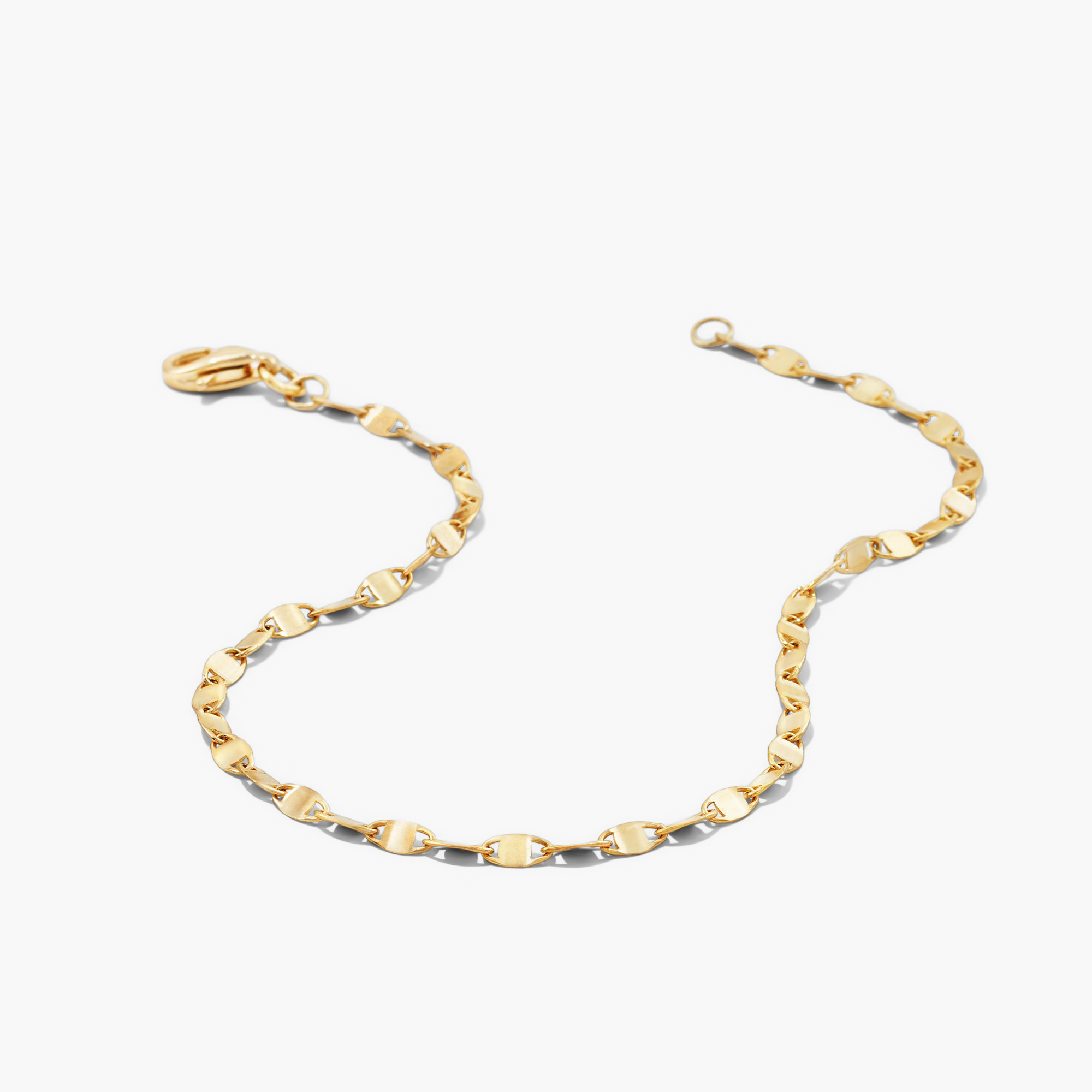 Anchor Chain Bracelet: A close-up of a handcrafted 14k gold chain bracelet with interconnected links resembling a ship's anchor chain, displayed on a plain background.