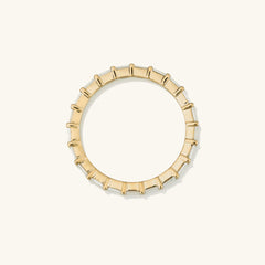 Baguette Diamond Eternity Band: A 14k solid gold ring adorned with Kimberley Process-certified baguette diamonds, showcasing timeless elegance and intricate craftsmanship.