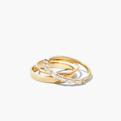 Baguette Diamond Half Eternity Band with eight baguette diamonds set in a timeless gold and silver stack.