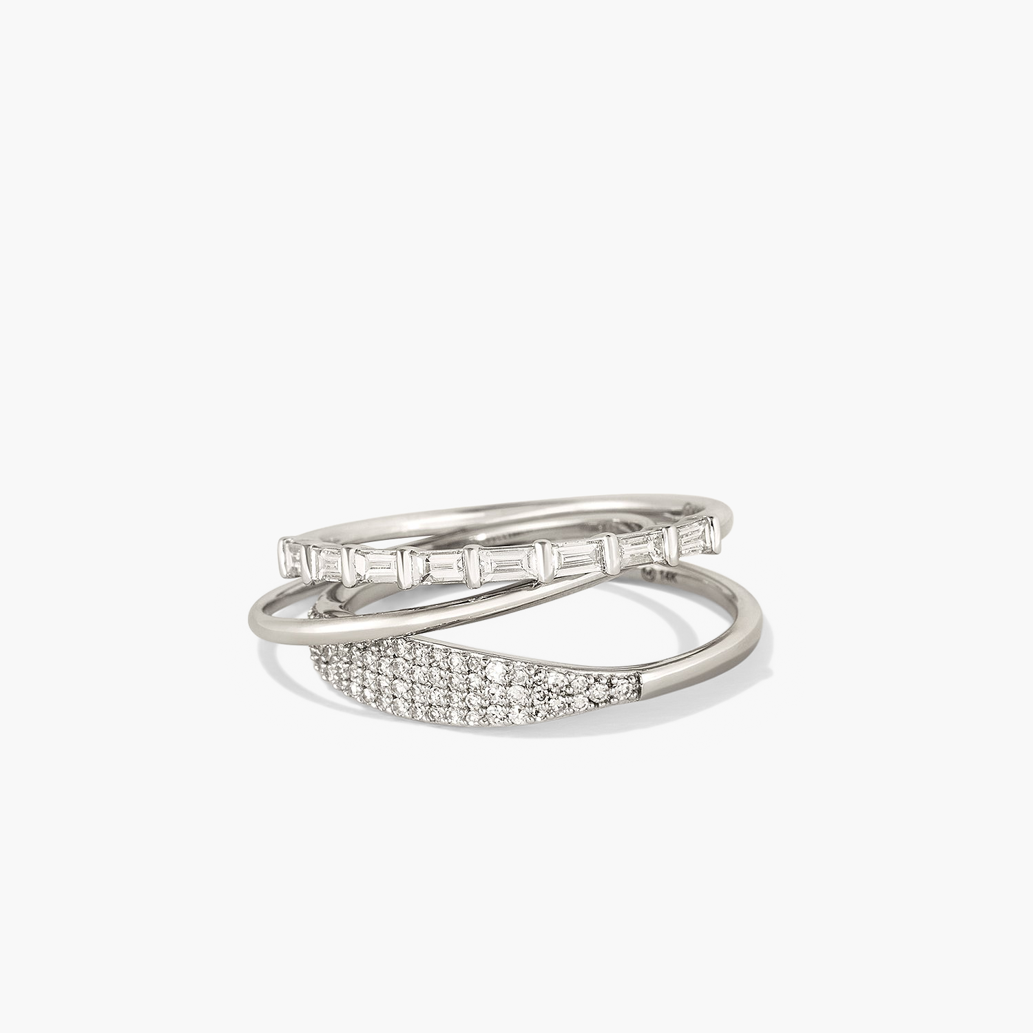 Baguette Diamond Half Eternity Band: a close-up of a stack of rings featuring eight baguette diamonds set in a classic, elegant band.