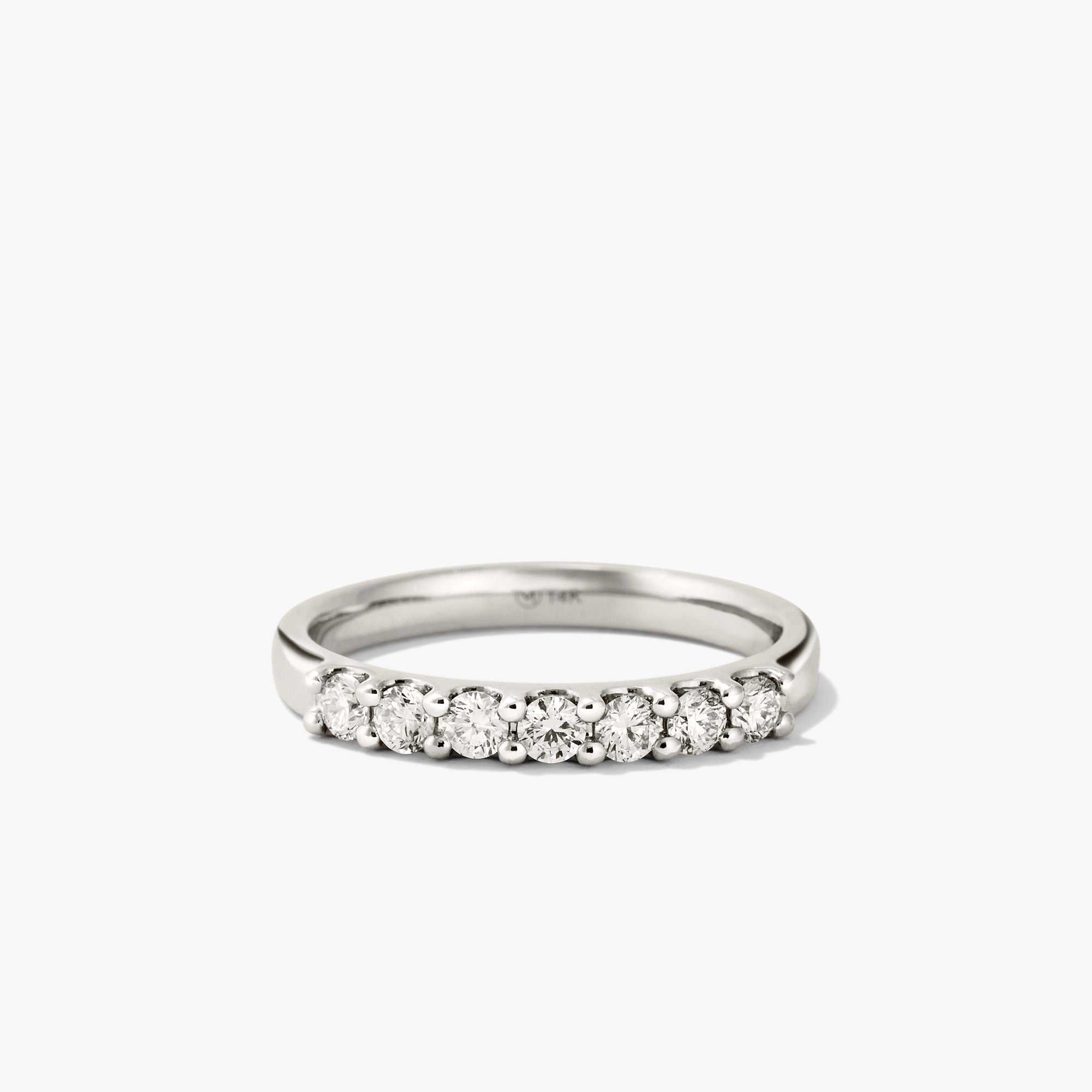 Bold Diamond Half Eternity Ring in 14k gold featuring seven round cut diamonds, perfect for stacking with the Bold Diamond Eternity Ring.