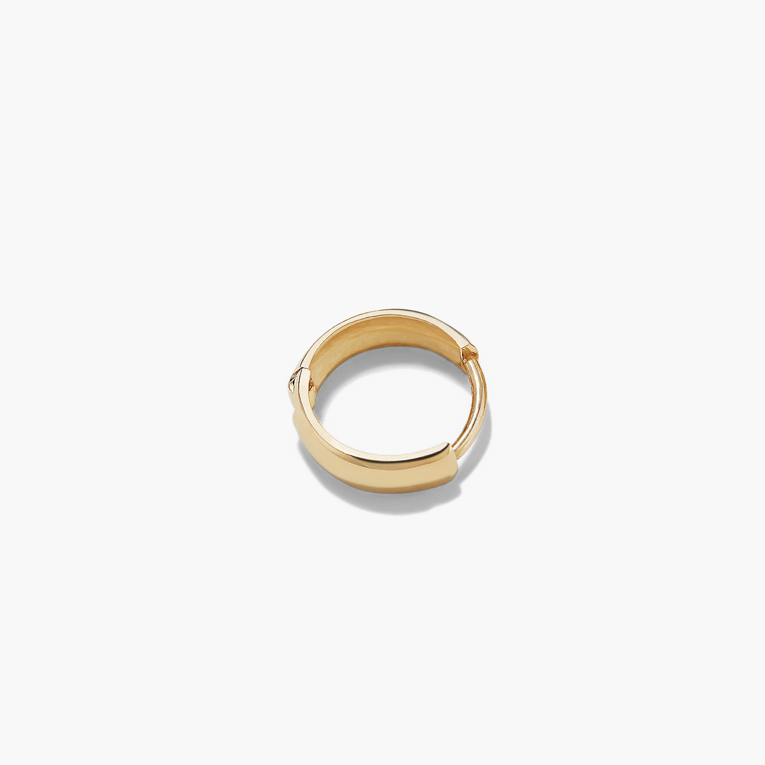 Single Bold Huggie Hoop in 14k solid gold, featuring a diamond accent on a white background. Handcrafted, stylish, and perfect for any outfit.