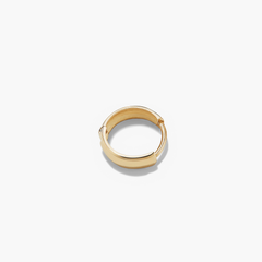 Single Bold Huggie Hoop in 14k solid gold, featuring a diamond accent on a white background. Handcrafted, stylish, and perfect for any outfit.