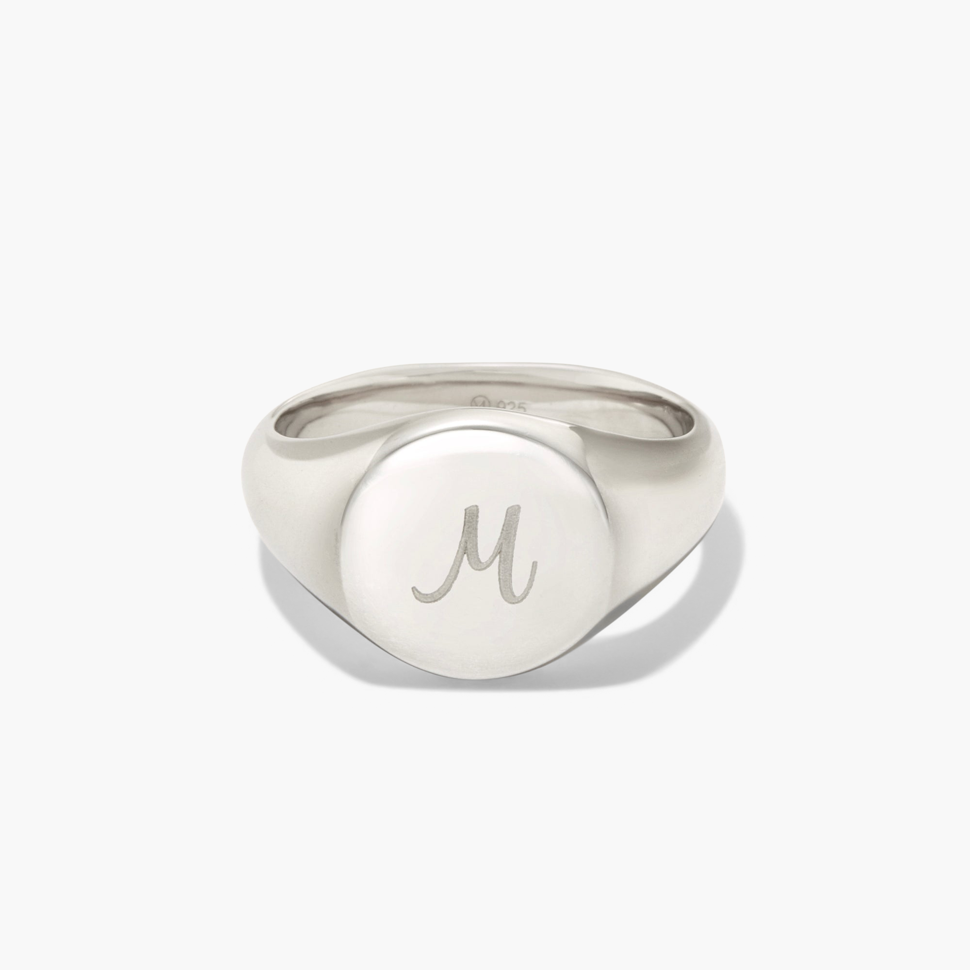 Bold Round Signet Ring in sterling silver with an engraved letter, showcasing a sleek, handcrafted design.