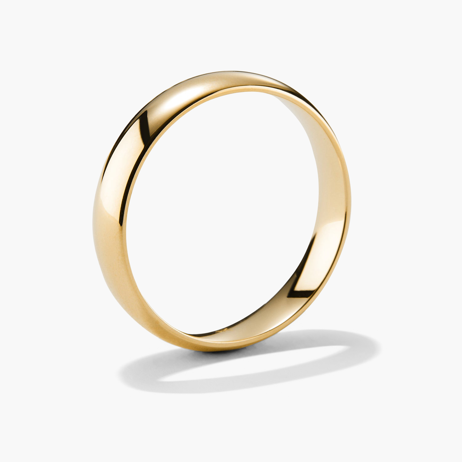 4mm Curve Band - A close-up of a sleek gold ring, ideal for marking a new chapter with its lightweight, durable design.