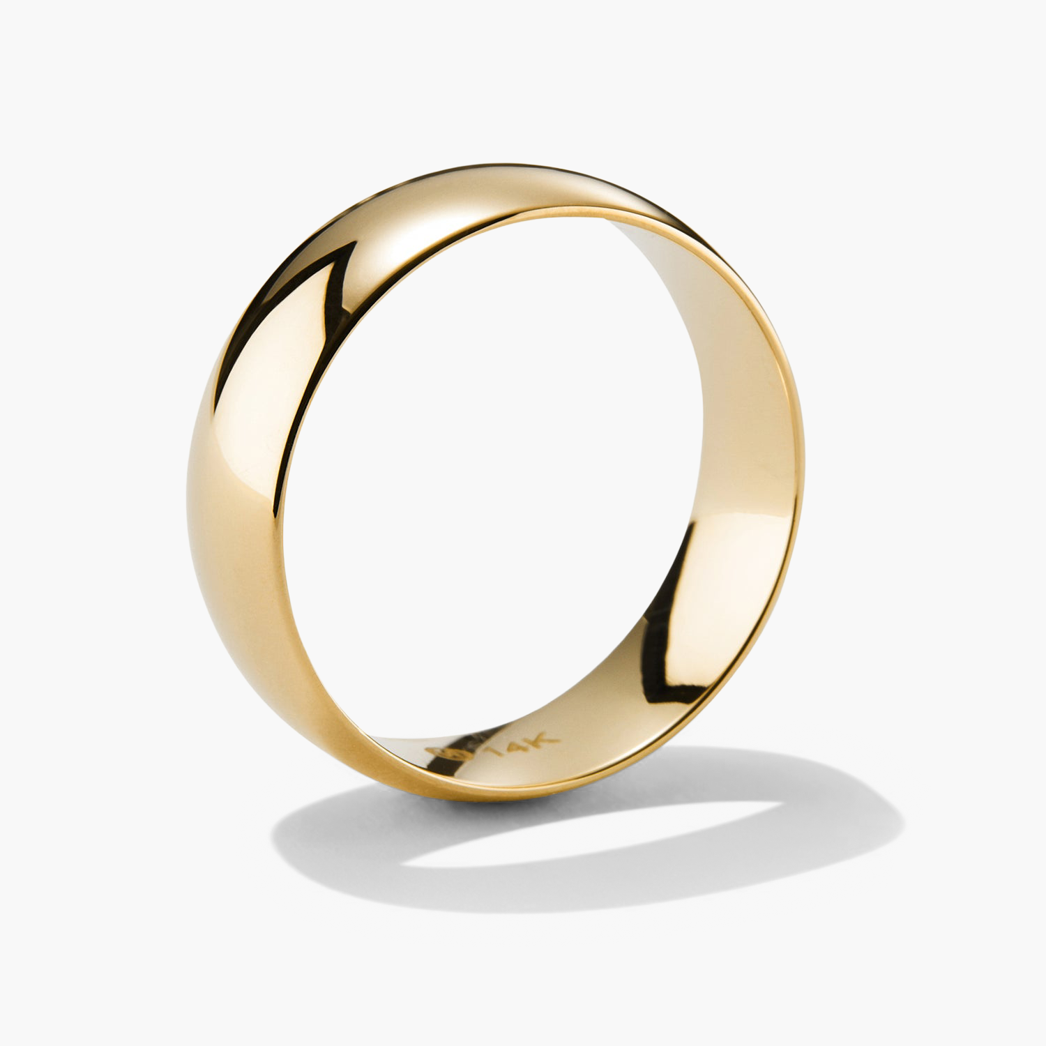 6mm Curve Band: A sleek, gold ring crafted for durability and elegance, perfect for marking life's significant moments.