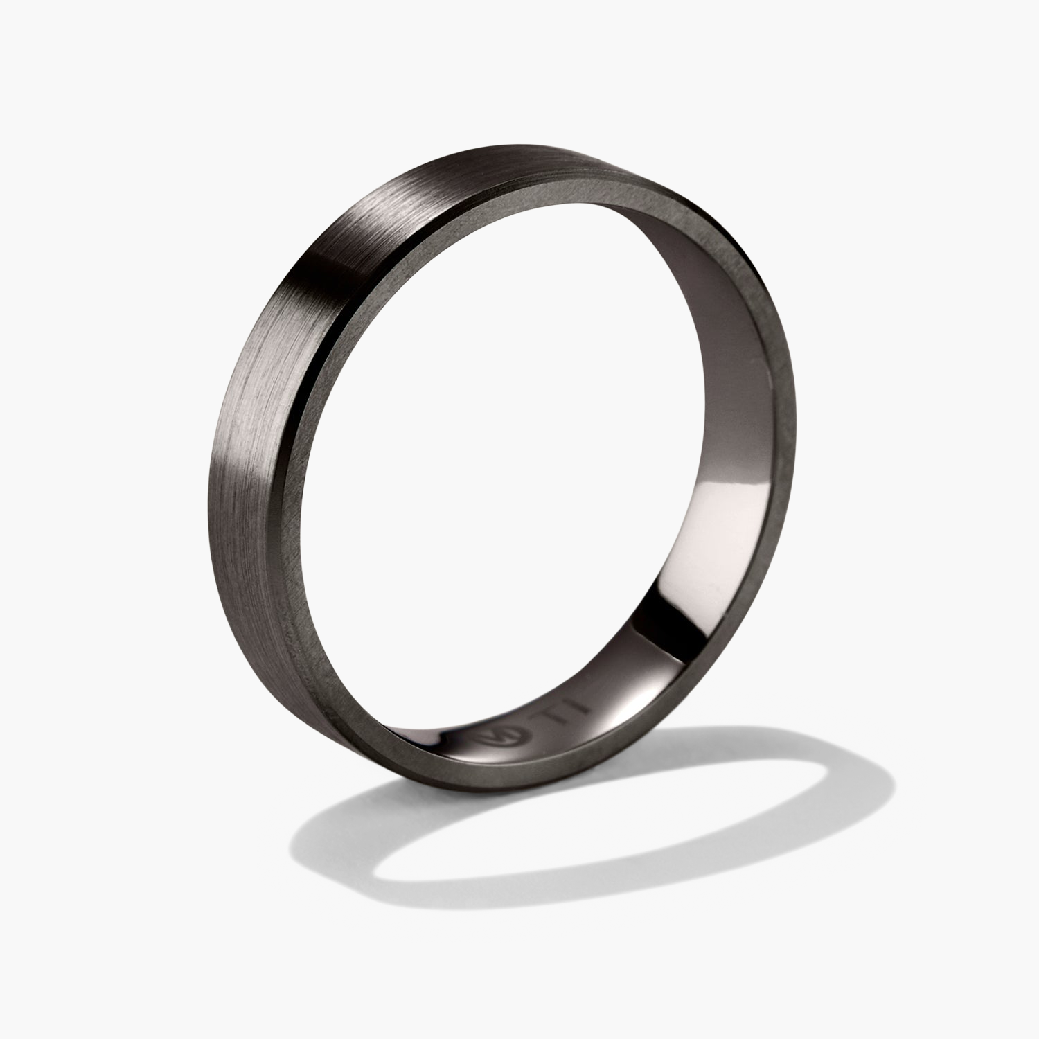 4mm Smooth Band, a close-up of a platinum ring, showcasing its sleek and lightweight design, perfect for marking significant life moments.
