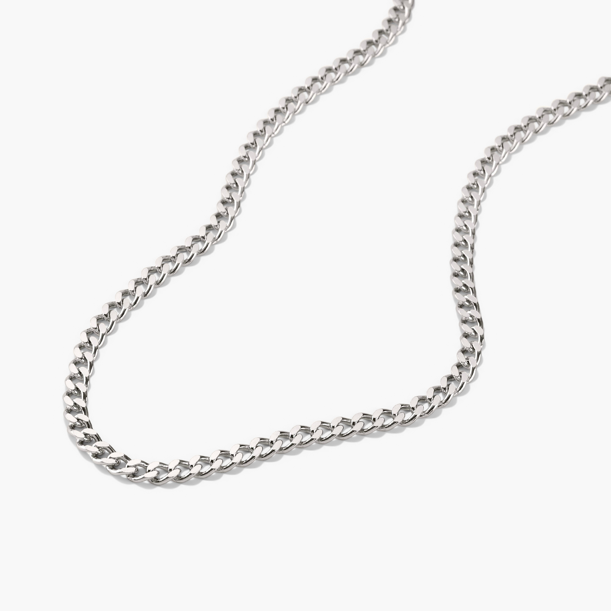 5mm Curb Chain Necklace: A close-up of a silver chain necklace, showcasing its classic and versatile design, ideal for everyday wear.