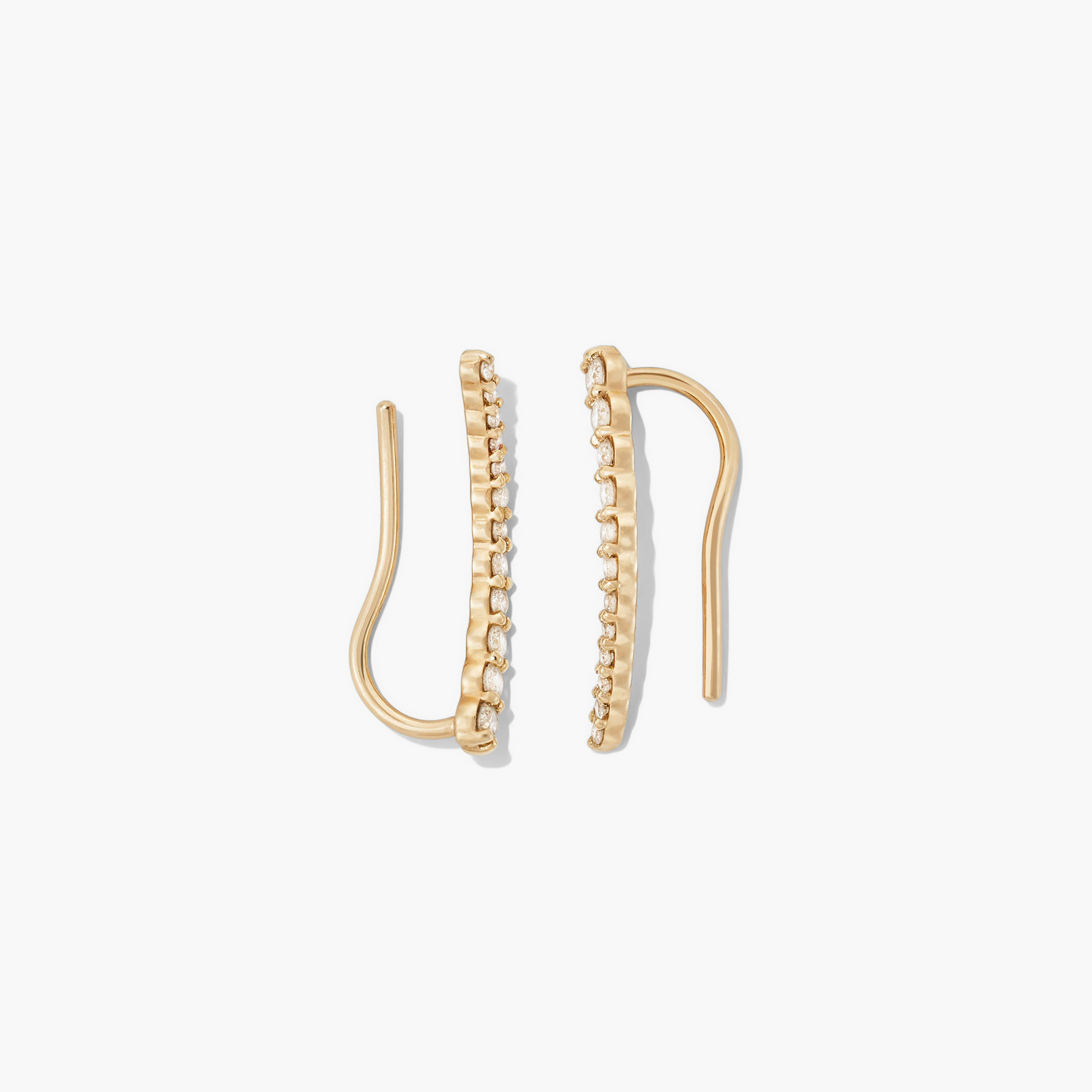 PavÃ© Diamond Climbers: A pair of 14k solid gold earrings adorned with pavÃ© diamonds designed to enhance ear real estate elegantly, suitable for single or multiple piercings.