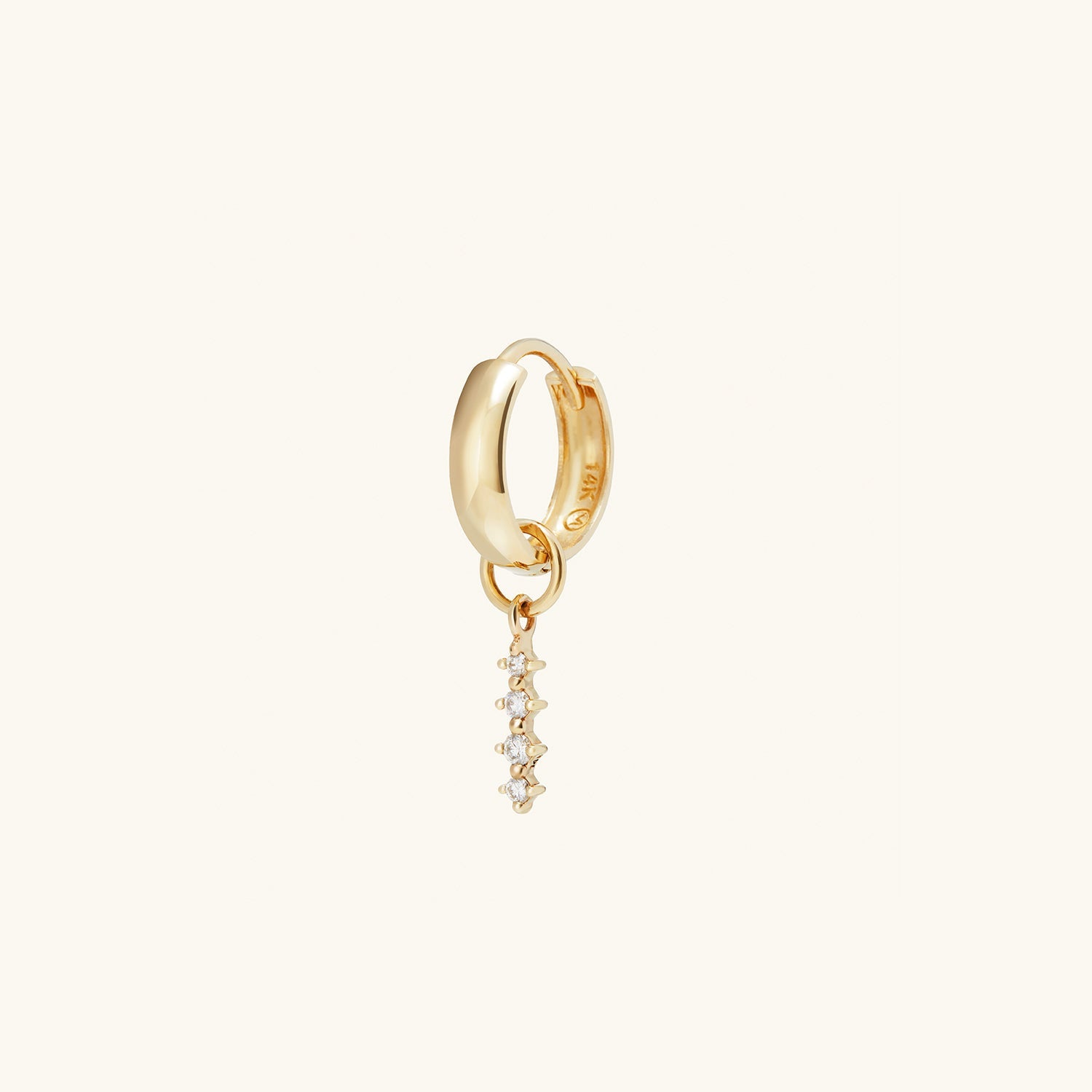 Gold hoop earring with a small diamond drop, known as Single Diamond Icicle Hoop Charm, ideal for personalizing your eardrobe with a chic, versatile look.