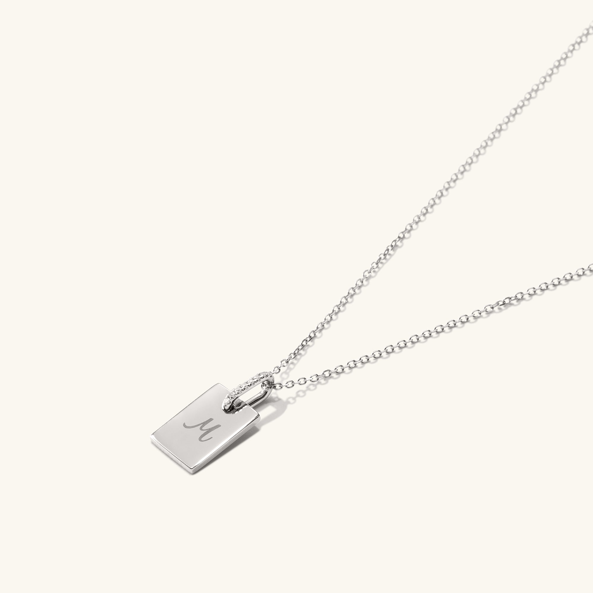 Pave Diamond Bail Tag Charm Pendant featuring a silver rectangular tag on a chain, accented with pavÃ© diamond-set bail for a classic, elegant look.