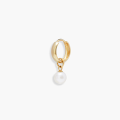 Single Pearl Hoop Charm: A gold hoop earring featuring a delicate dangling pearl, perfect for enhancing your everyday eardrobe with a touch of elegance.