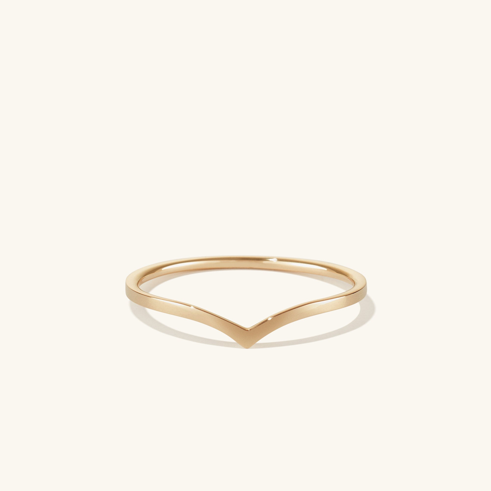 Wishbone Ring: 14k solid gold ring with a curved edge, ideal for stacking and as a good luck charm. Handcrafted for elegance and style.