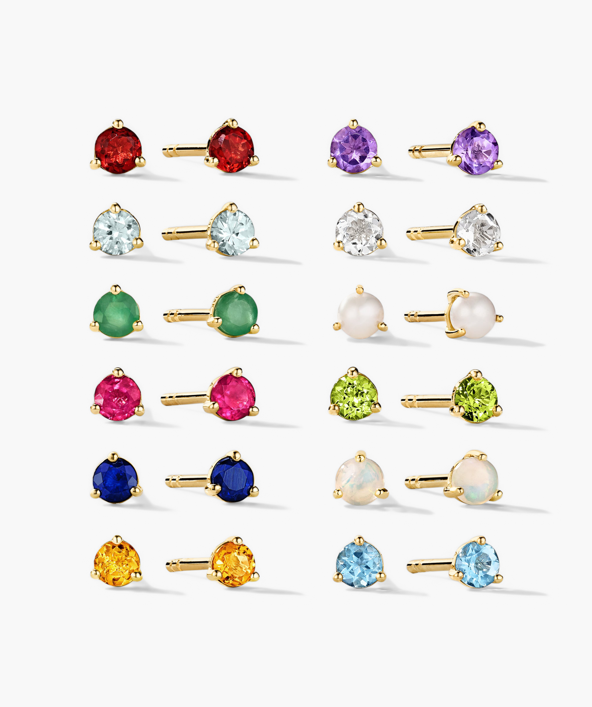 Gemstone Mini Studs (Copy) in yellow-gold prong settings, featuring diverse gemstones and pearls, displayed in a grid showing both front and side views.