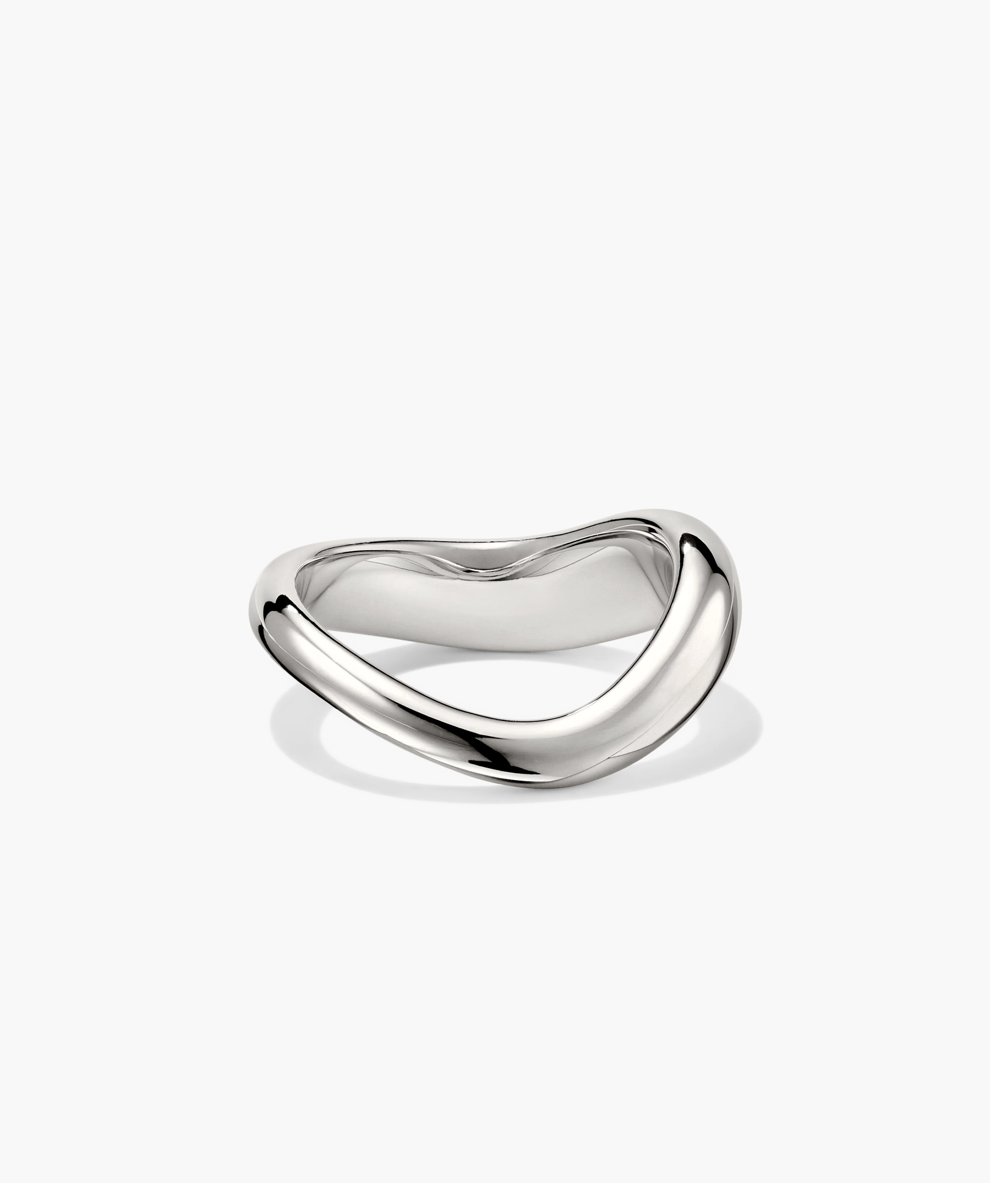 DÃ´me Figure Ring: A silver ring with a unique curved design, reflecting intricate craftsmanship and inspired by slow, intentional movement.