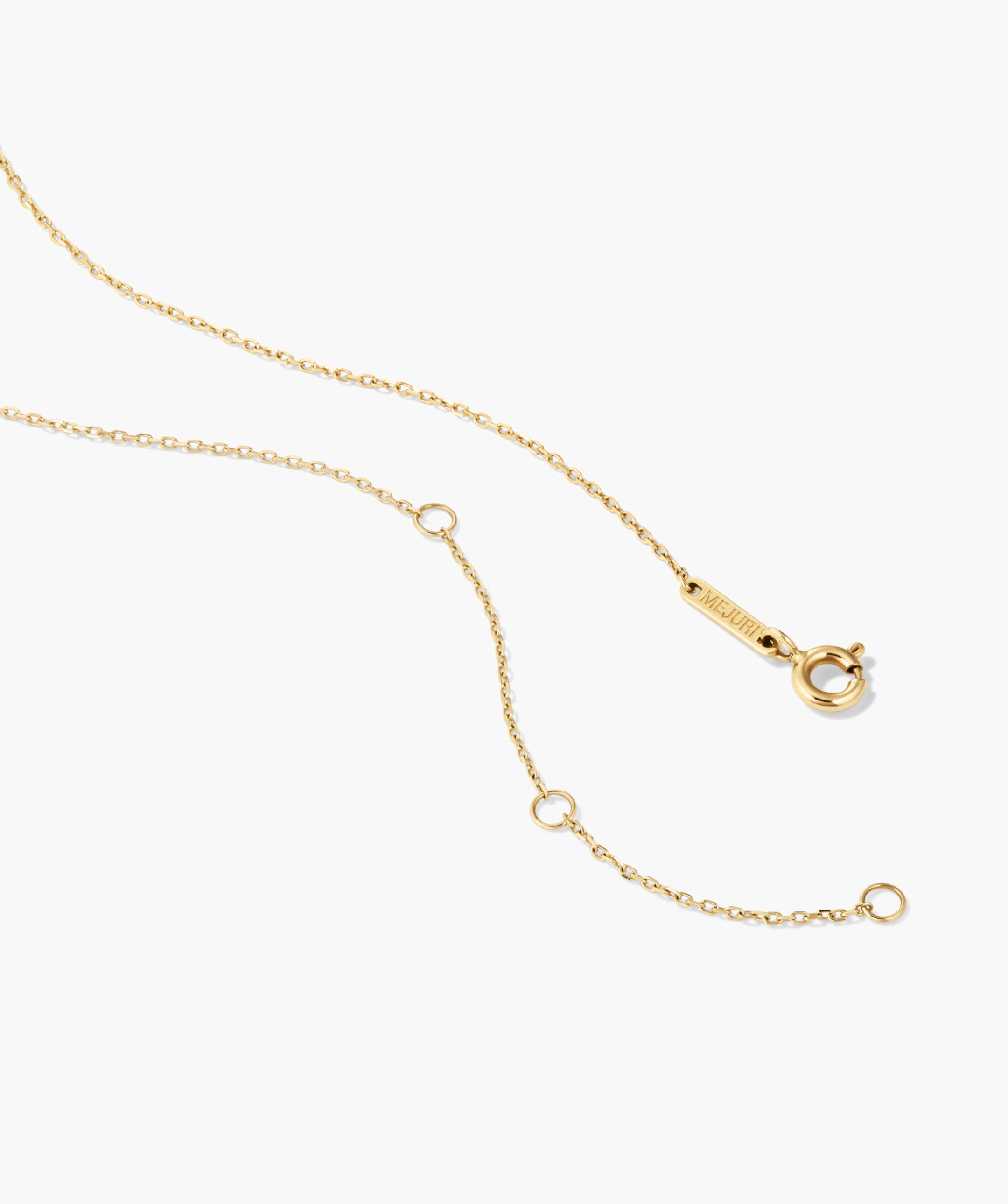 Fleurette Necklace featuring a fine gold chain with adjustable length, a spring-ring clasp, and a five-petal silhouette adorned with lab-grown diamond accents.