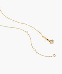 Fleurette Necklace featuring a fine gold chain with adjustable length, a spring-ring clasp, and a five-petal silhouette adorned with lab-grown diamond accents.