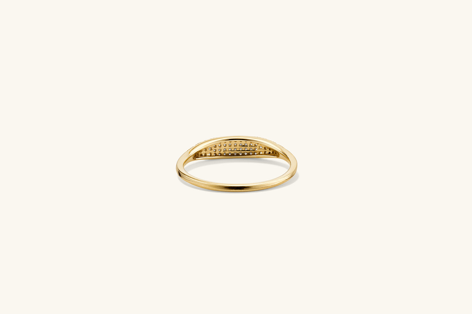 PavÃ© Diamond Slim Signet: A stunning gold ring adorned with sparkling diamonds, designed for a dazzling yet low-commitment statement.