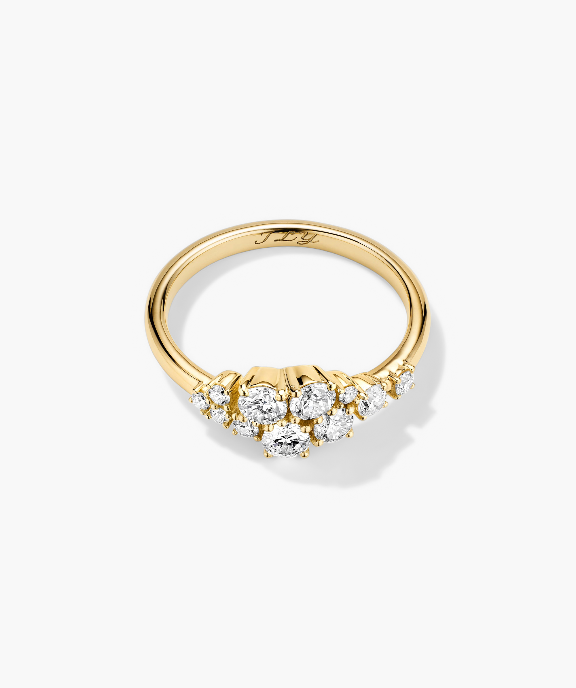 Diamonds Cluster Ring with an asymmetric design featuring eleven prong-set diamonds, showcasing a unique, heirloom-worthy style.