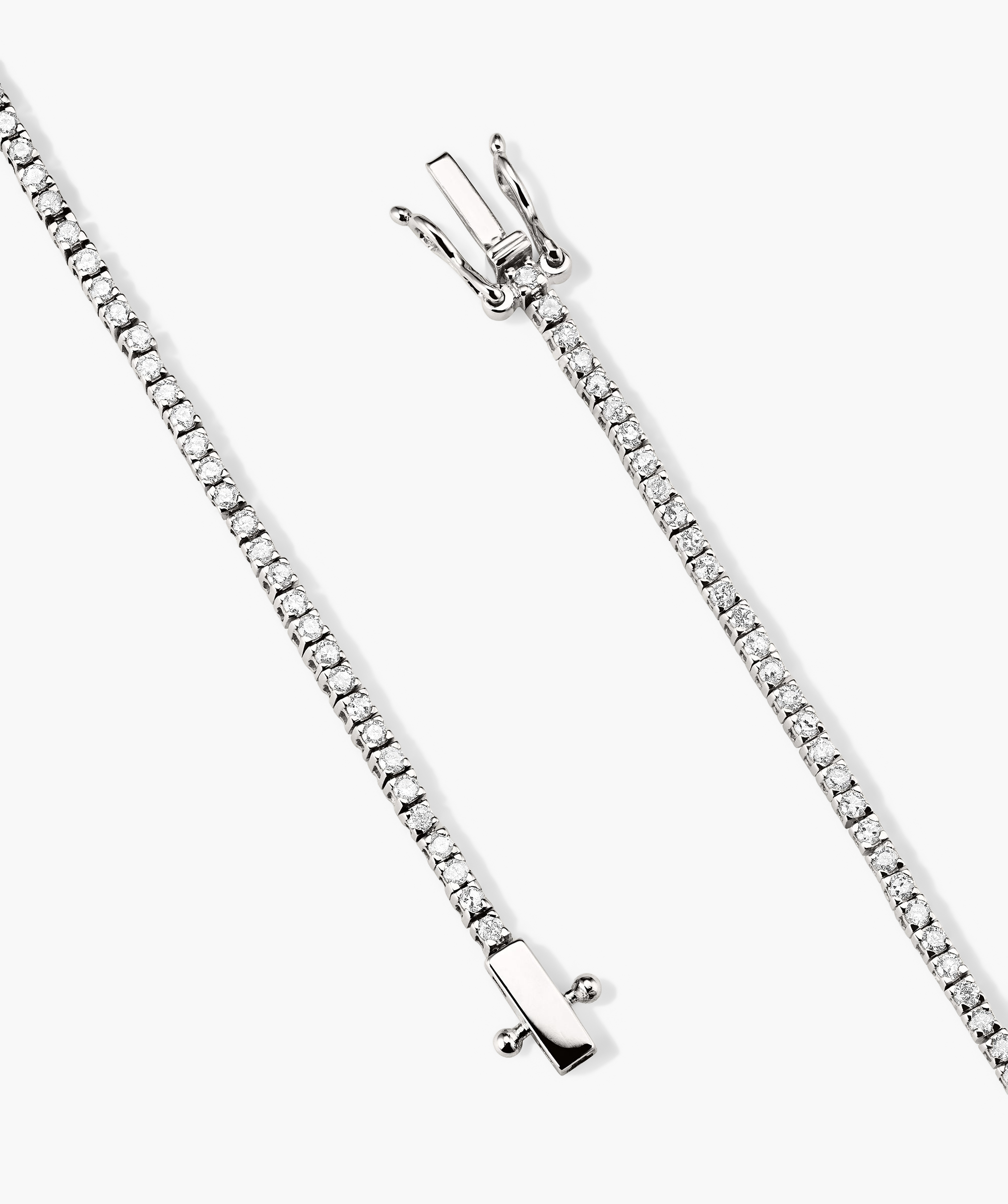 Diamond Tennis Bracelet 1.3mm, a close-up showcasing a delicate, handcrafted 14k gold bracelet with a row of sparkling, responsibly sourced diamonds.