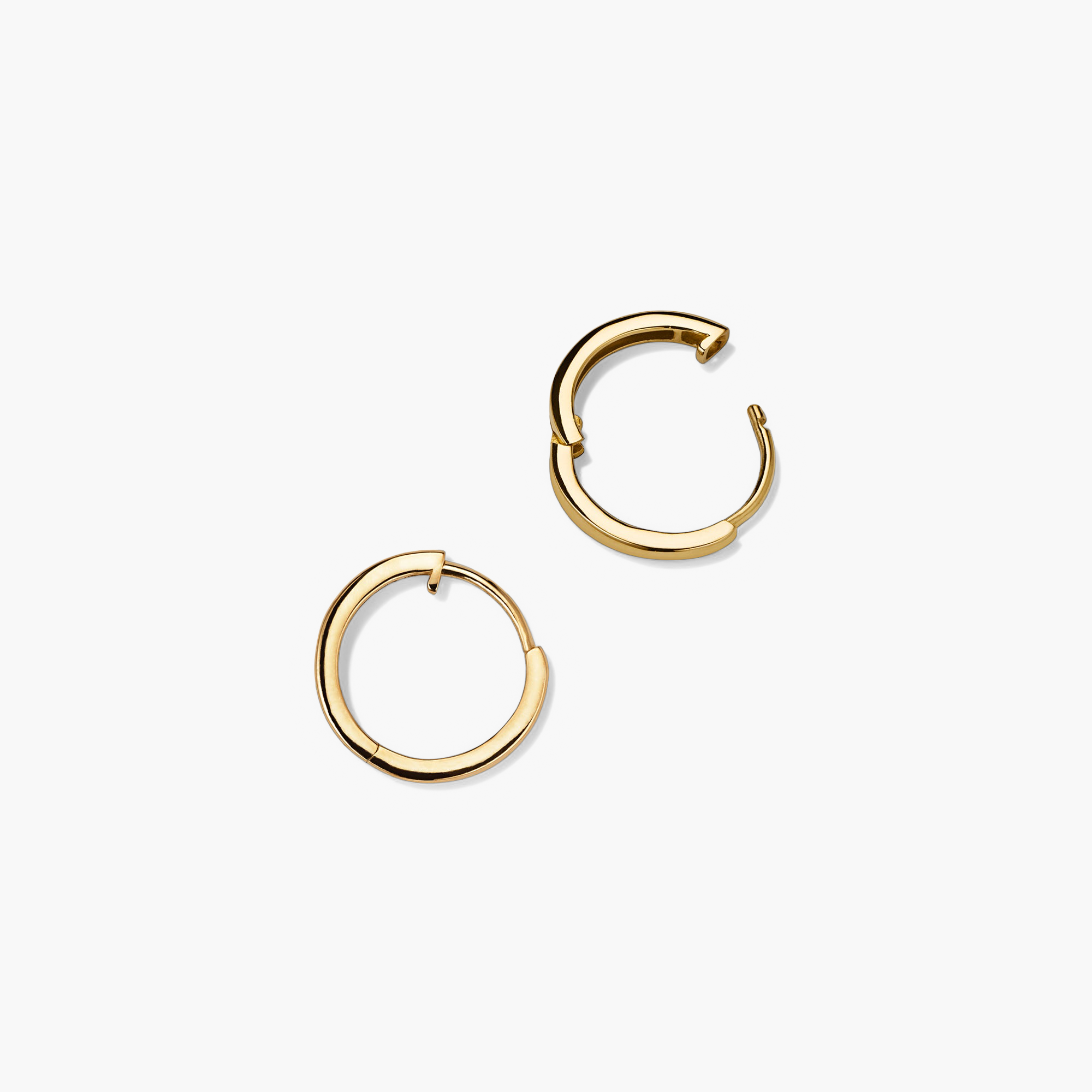 Easy Huggie Hoops: Handcrafted 14k gold hoop earrings with a clicker closure for comfort and security. Perfect for daily wear.