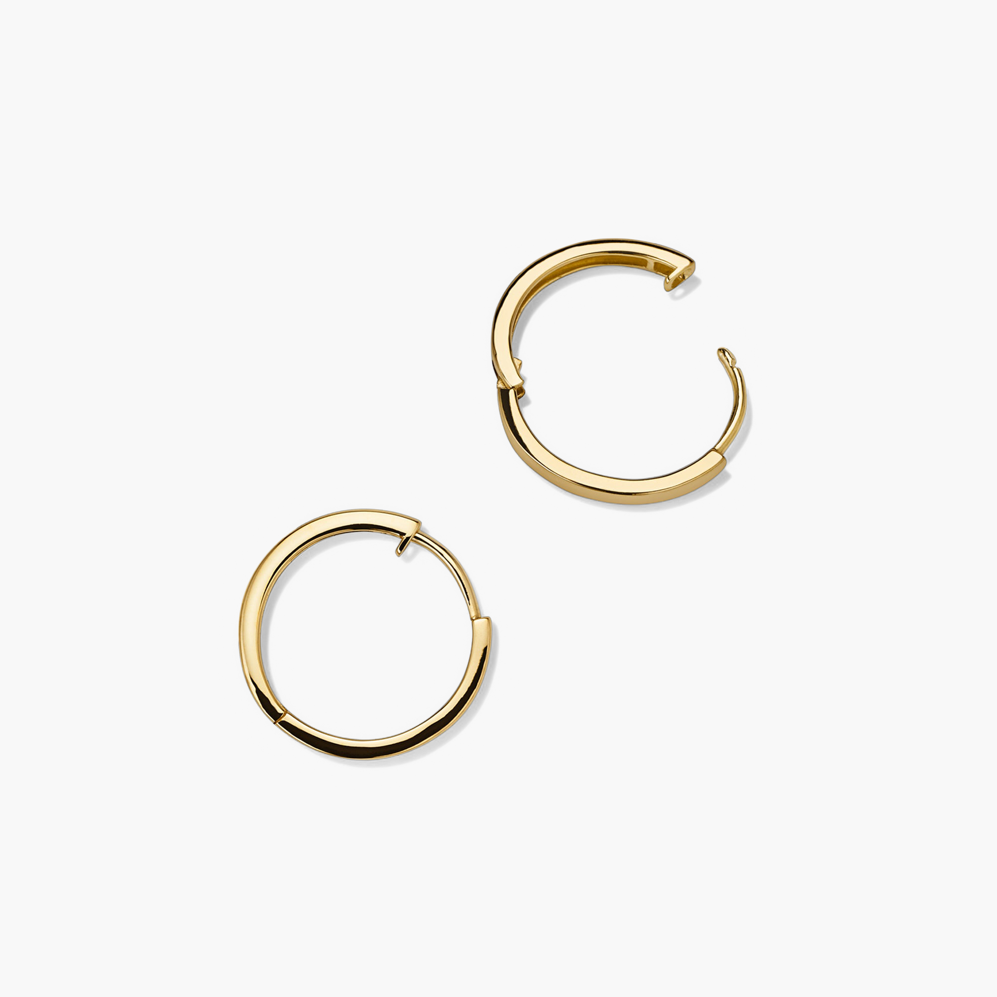 Easy Small Hoops: A pair of handcrafted 14k gold hoop earrings with a clicker closure, designed for everyday comfort and effortless style.