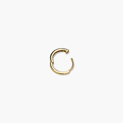 Single Easy Huggie Hoop: Handcrafted in hollowed 14k gold with a clicker closure, designed for daily wear, ensuring comfort and security.