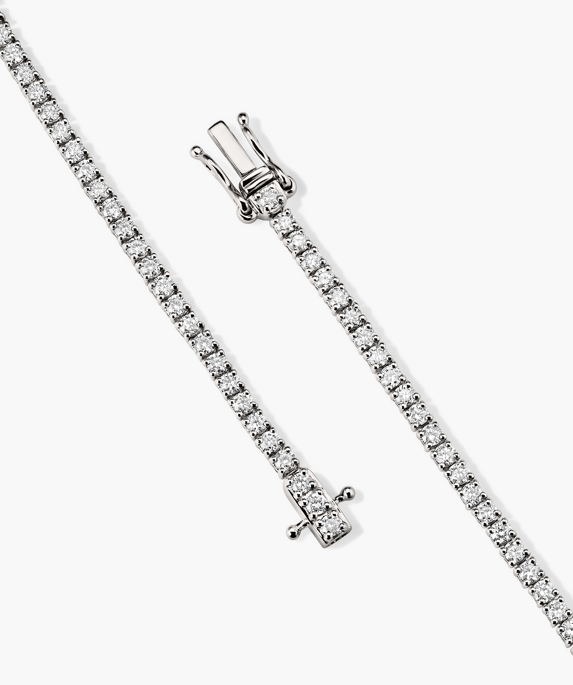 Lab Grown Diamond Tennis Necklace 1.8mm: A close-up of a silver necklace with lab grown diamonds, featuring a secure clasp with safety arms.