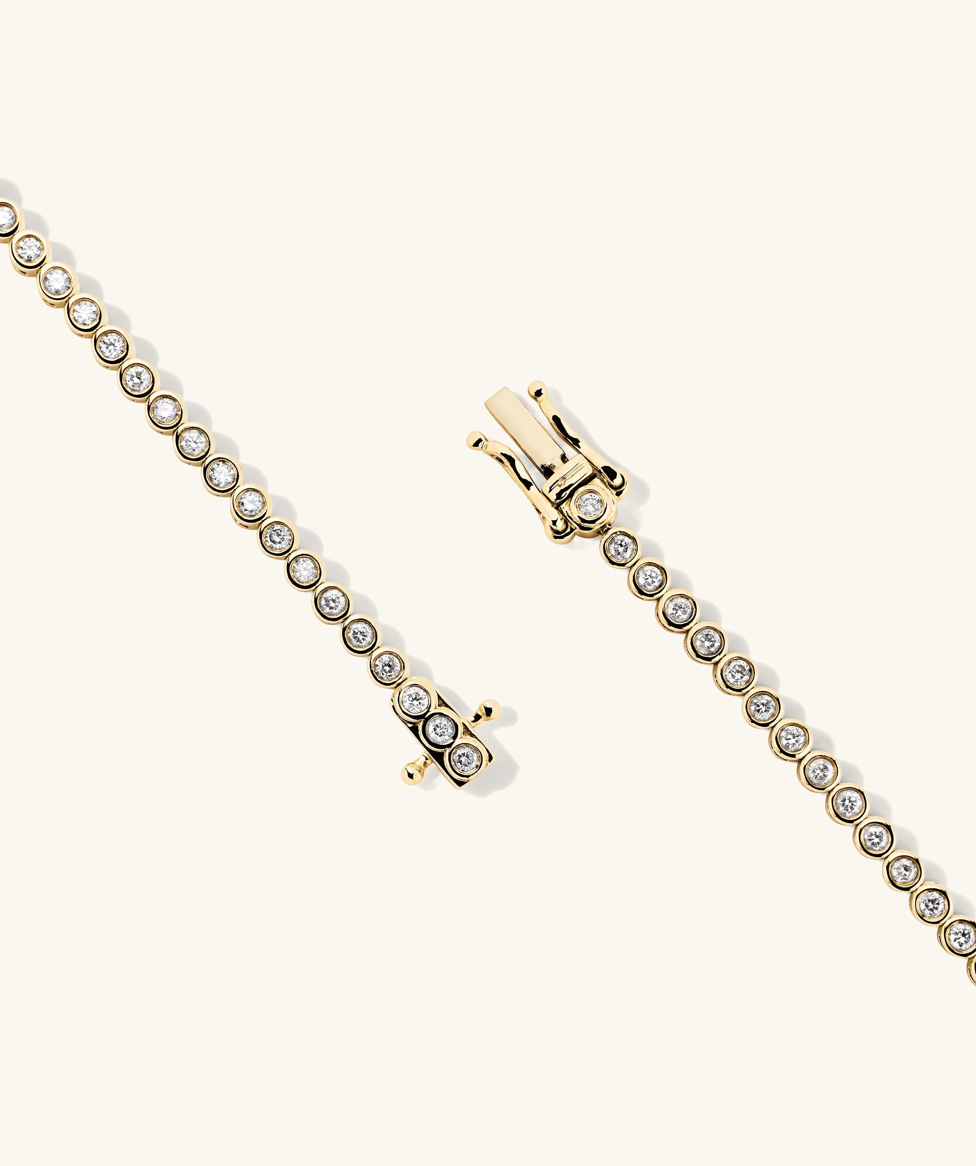 Bezel Lab Grown Diamond Tennis Bracelet handcrafted in 14k solid gold, featuring bezel-set lab-grown diamonds.