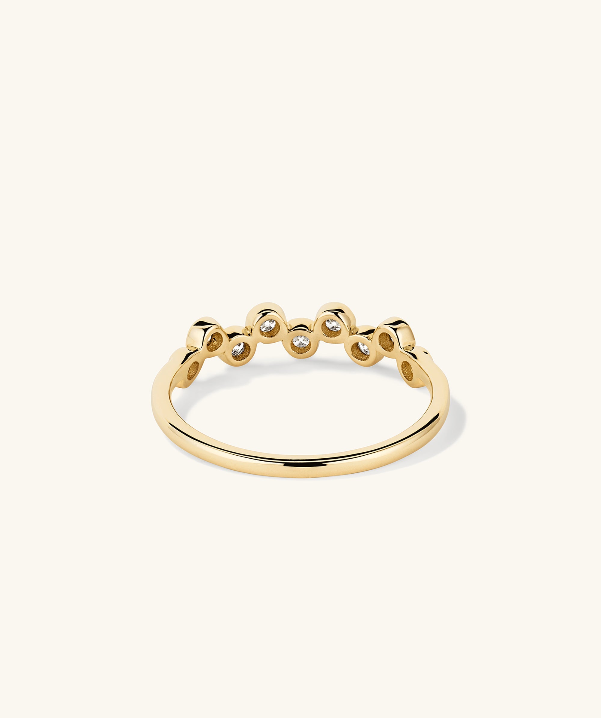 Bezel Lab Grown Diamond Zig-Zag Ring, a 14k gold ring featuring bezel-set lab grown diamonds in a zig-zag pattern.
