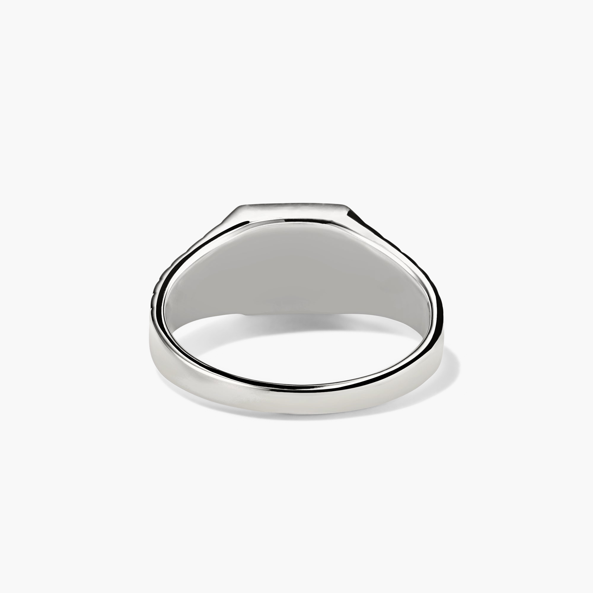 Black Onyx Square Signet Ring featuring a silver band with a prominent black onyx gemstone, ideal for adding a touch of sophistication to any outfit.