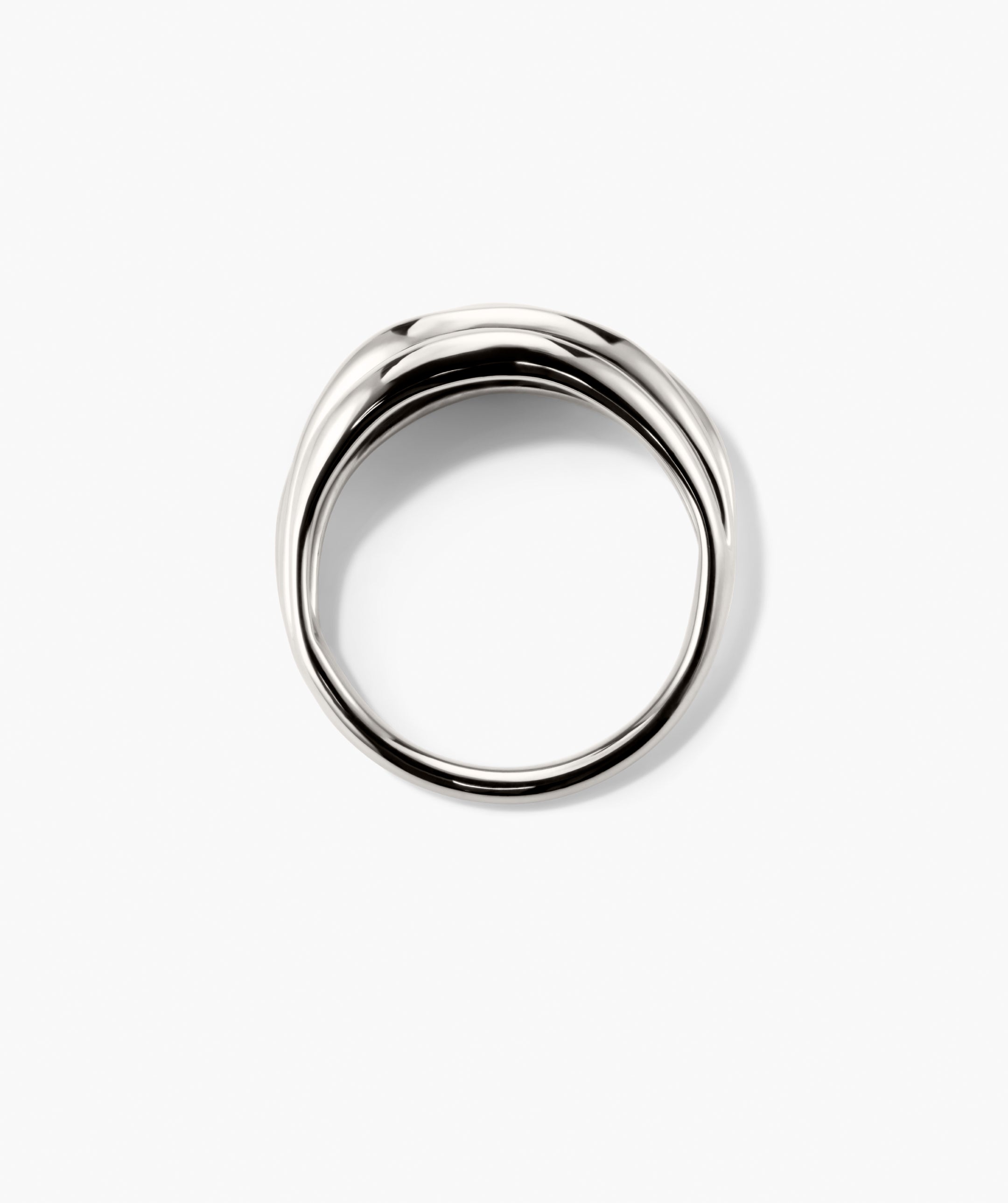 Bold Open DÃ´me Ring: A sleek silver band with subtle undulations, showcasing open spaces and an asymmetrical design for a minimalist yet impactful statement.