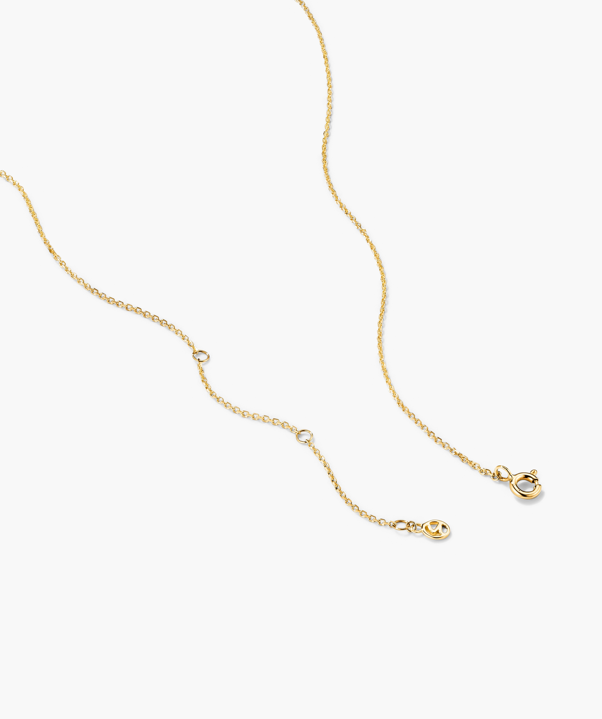 Baguette Gemstone Station Necklace featuring a gold chain with evenly spaced diamonds, perfect for layering and adding a touch of elegance to any outfit.