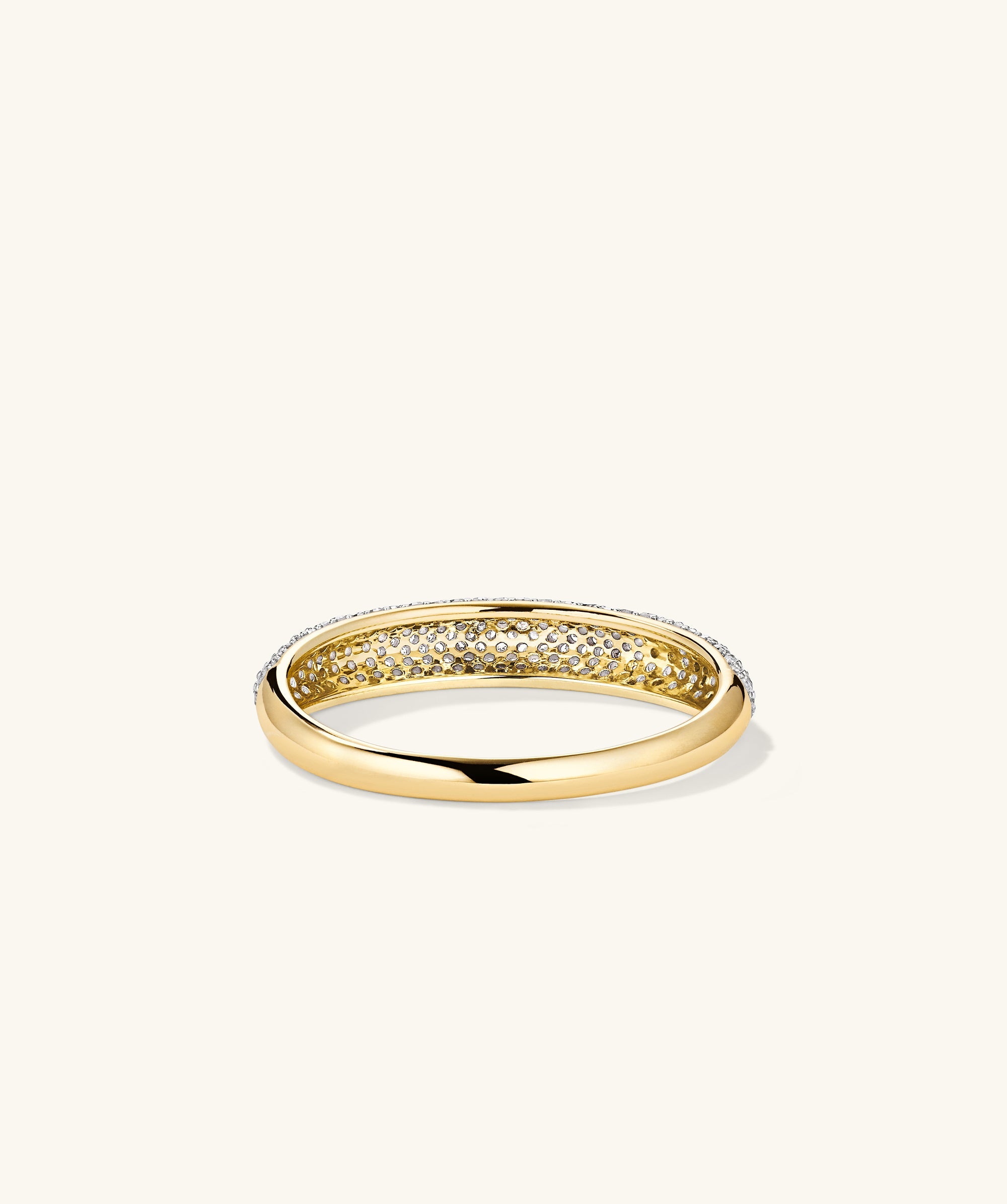 PavÃ© Diamond Thin DÃ´me Ring in 14k gold, adorned with multiple diamonds for a striking, luxurious statement.