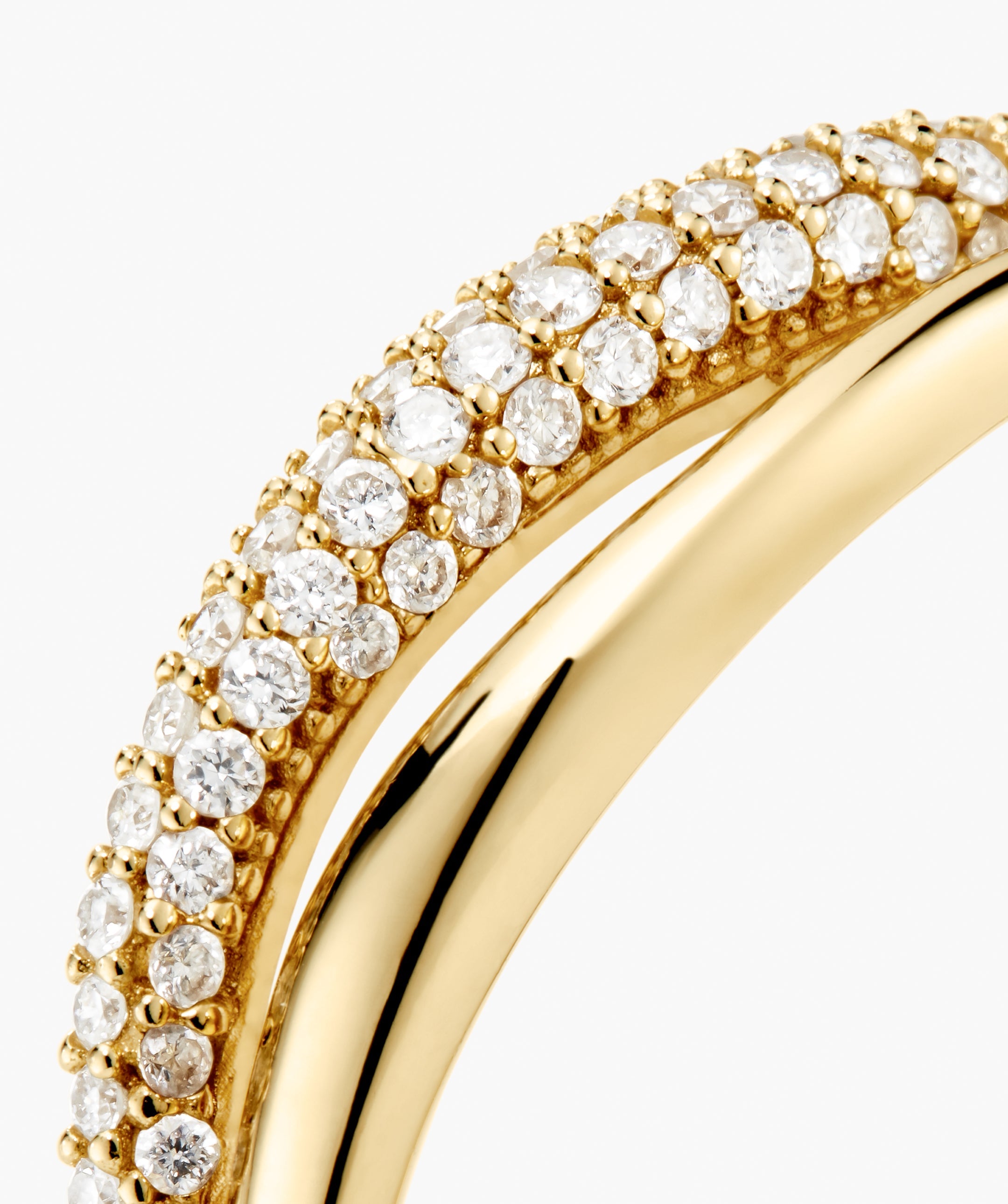 Open DÃ´me PavÃ© Ring featuring a smooth yellow-gold band paired with a pavÃ© diamond band, crafted in 14k Salmon GoldTM for sustainable elegance.