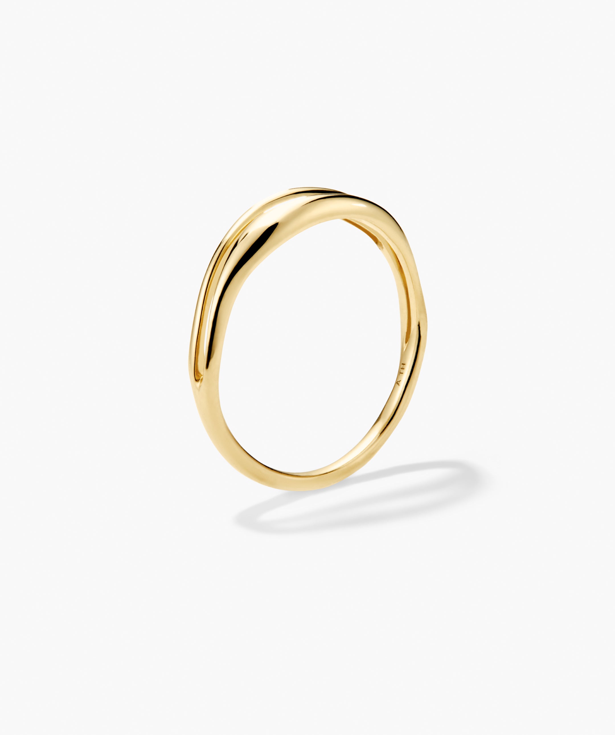 Open DÃ´me Ring: A minimalist gold band with a wavy profile, crafted from responsibly sourced, traceable Salmon Gold, supporting habitat restoration in North America.
