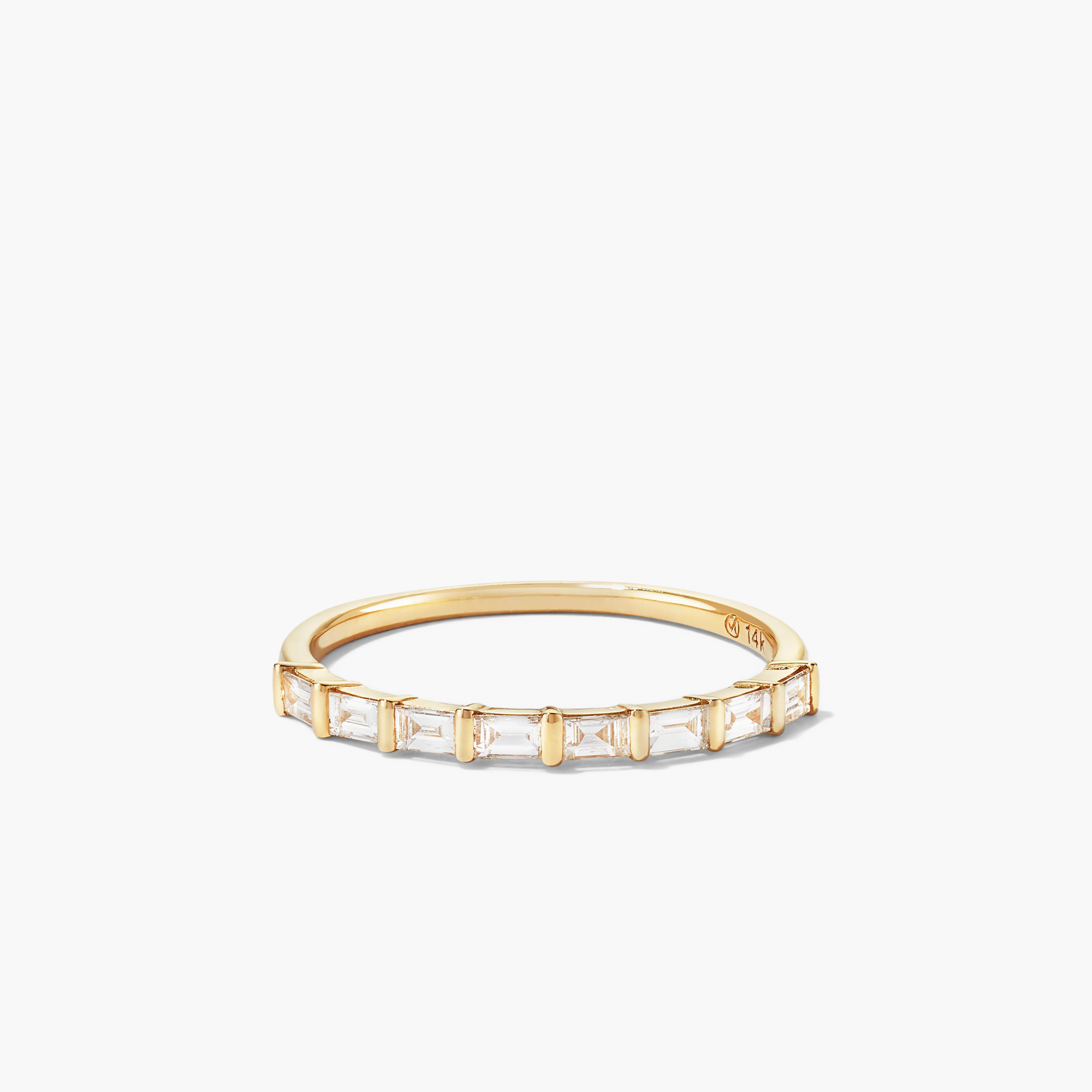 Baguette Diamond Half Eternity Band: a gold ring featuring eight baguette diamonds set in a timeless style.
