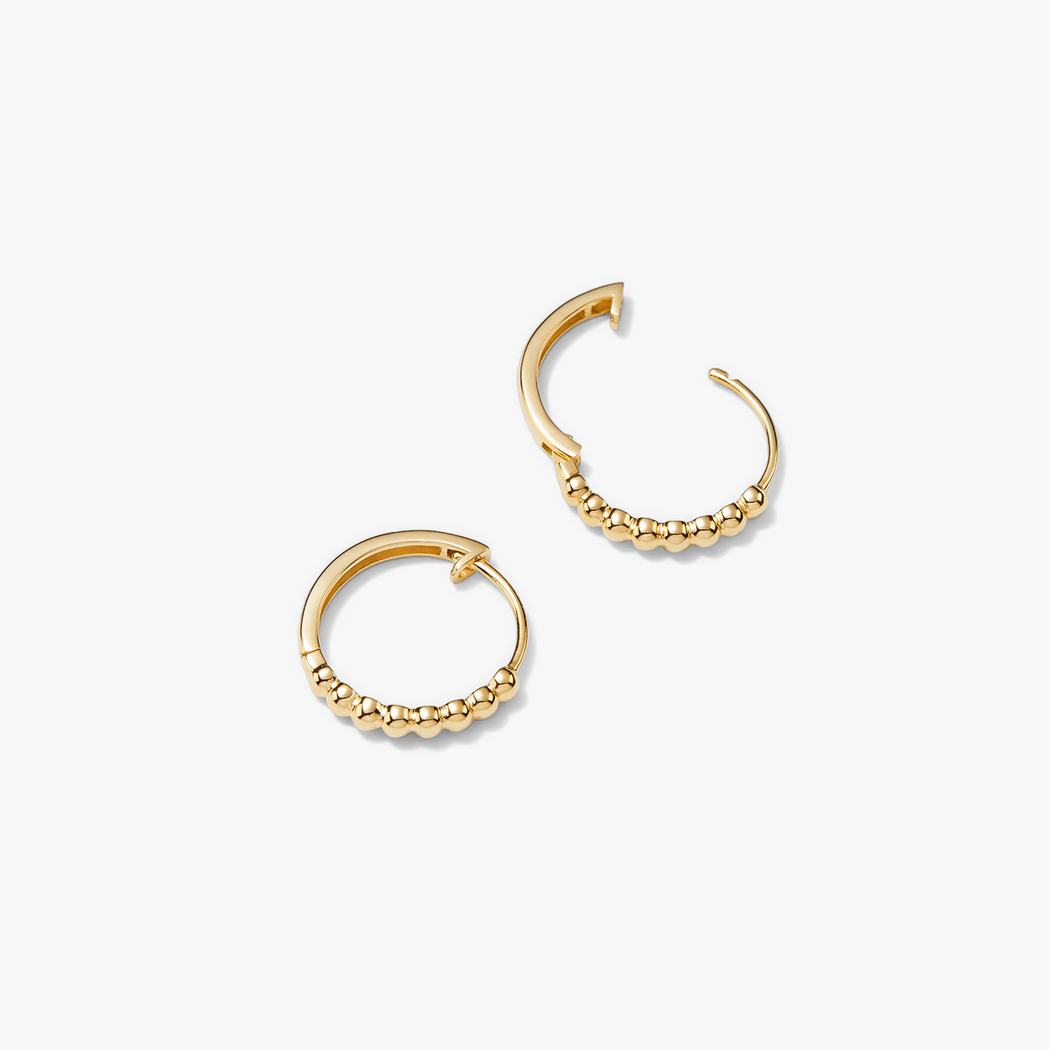 Beaded Small Hoops: A pair of handcrafted, recycled 14k solid gold hoop earrings featuring delicate beads for a stylish, elevated look.