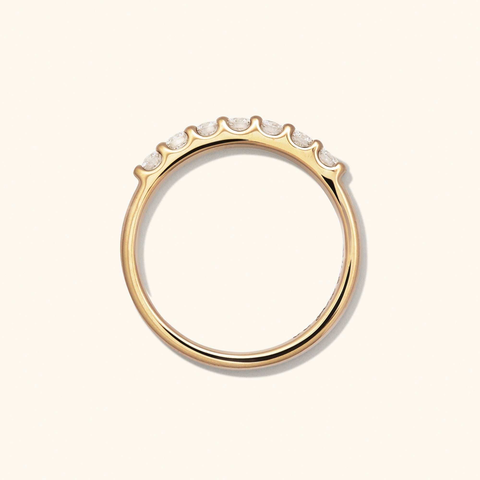 Bold Diamond Half Eternity Ring in 14k gold, featuring seven round cut diamonds, perfect for stacking with other rings.