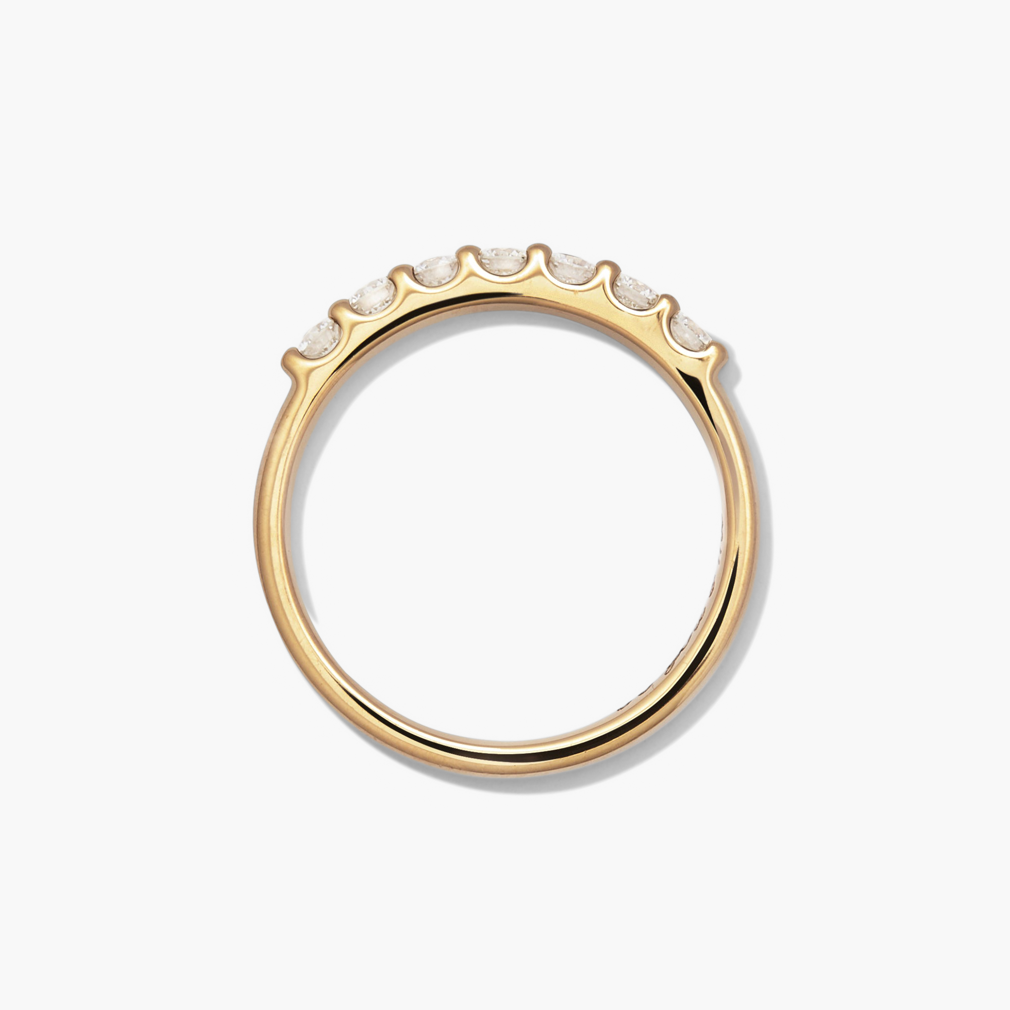 Bold Diamond Half Eternity Ring in 14k gold, featuring seven round cut diamonds, perfect for stacking with other rings.