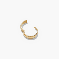 Single Bold Huggie Hoop: A handcrafted 14k solid gold hoop earring with a smooth, curved design, perfect for elevating any outfit.