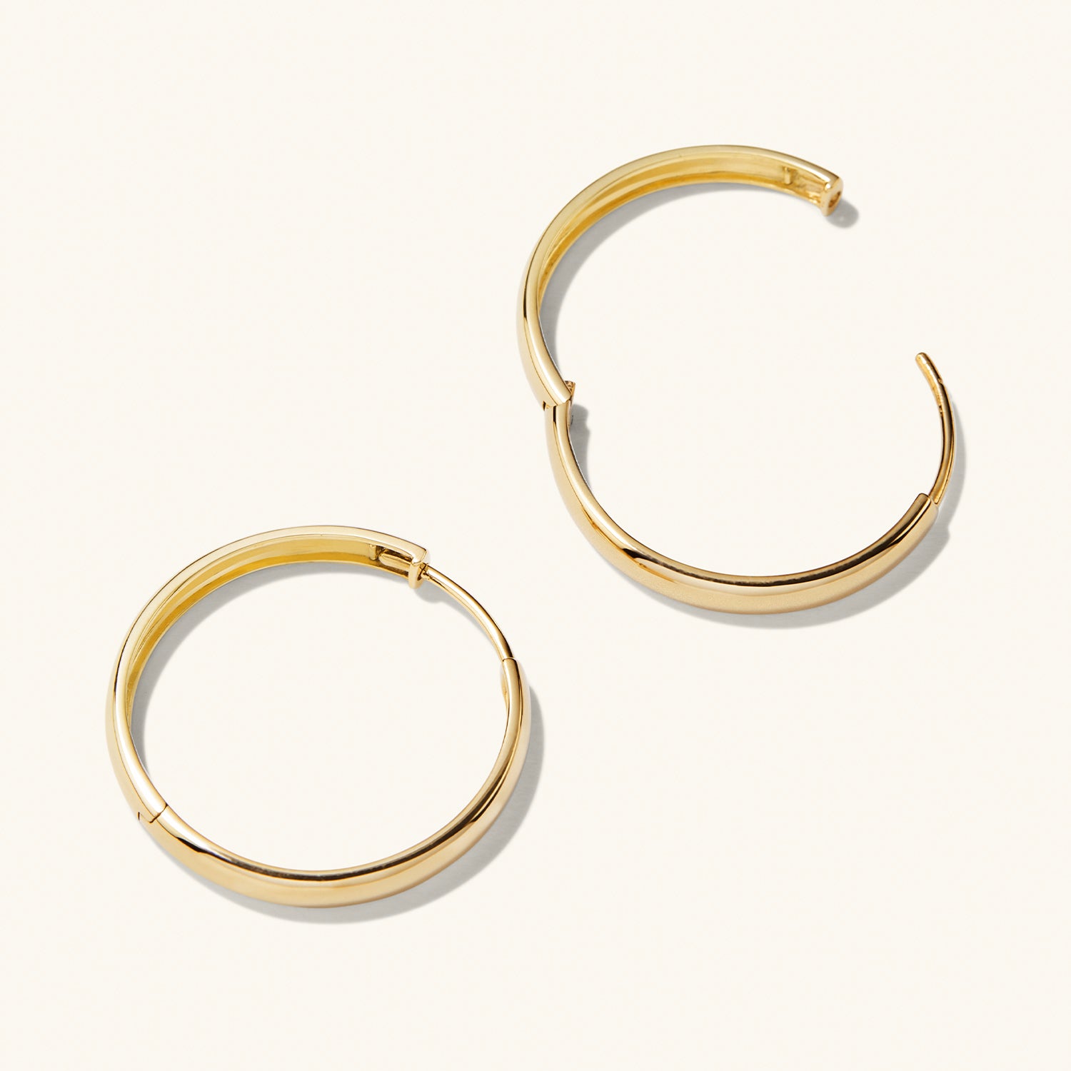 Bold Large Hoops: Handcrafted 14k solid gold hoop earrings, ideal for elevating any outfit with a timeless, bold statement.