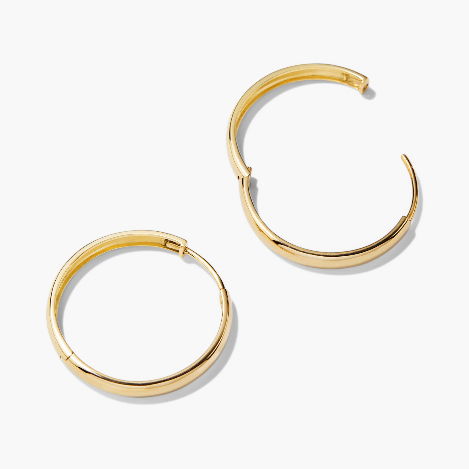 Bold Large Hoops: Handcrafted 14k solid gold hoop earrings, ideal for elevating any outfit with a timeless, bold statement.