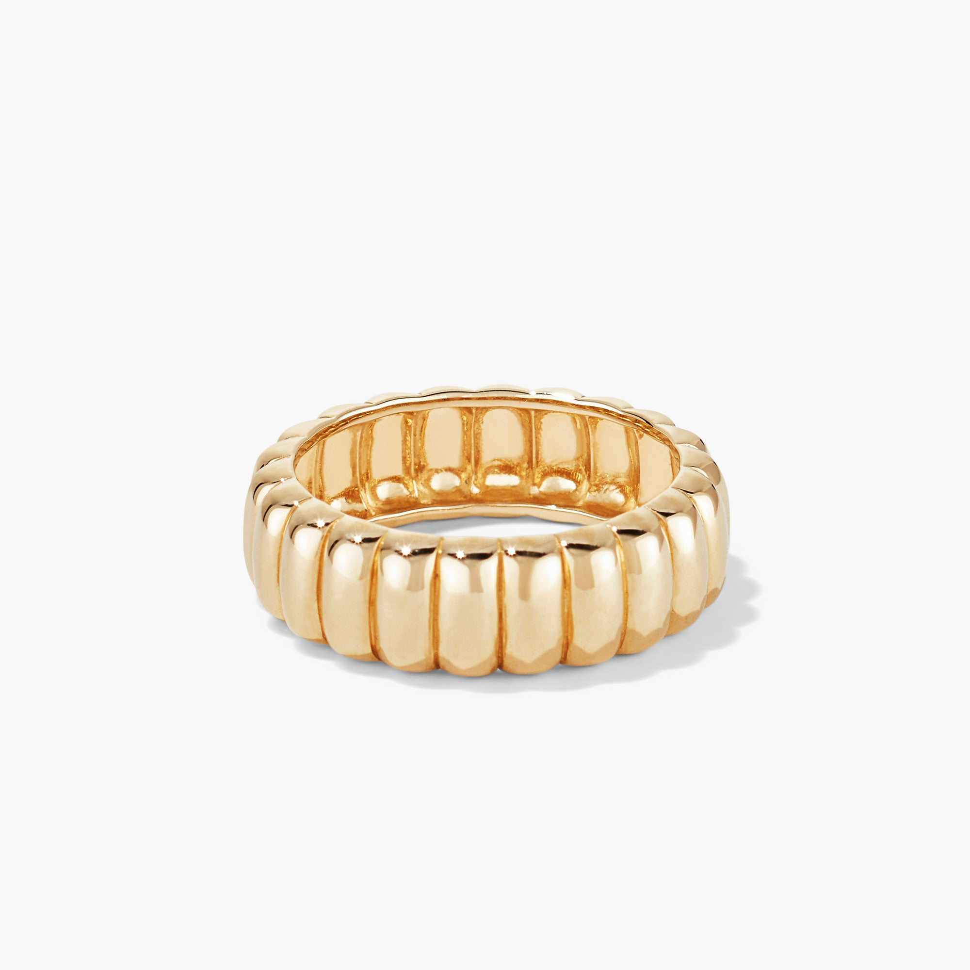 Gold ring with a curved design, named Charlotte Ring. Inspired by French desserts, it adds elegance to any fashion accessory collection.