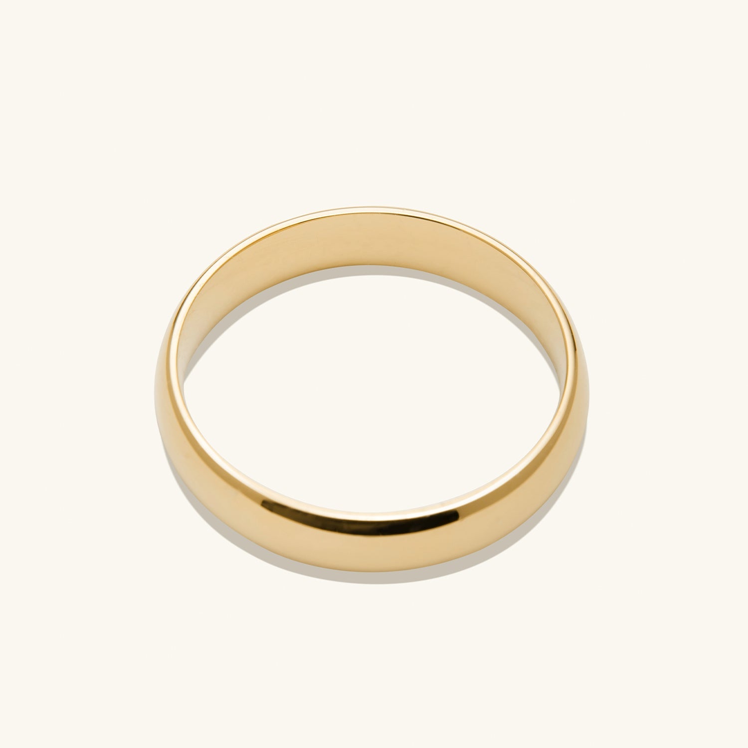 4mm Curve Band: A simple, elegant gold ring, ideal for marking significant life moments with its lightweight and enduring design.